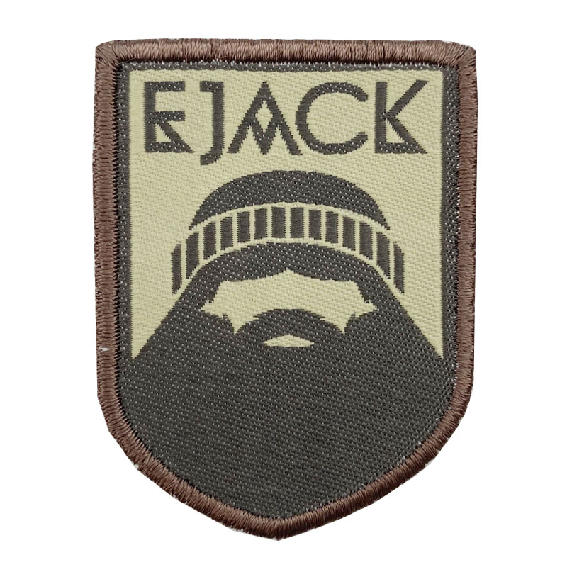 Embroidered woven patch
